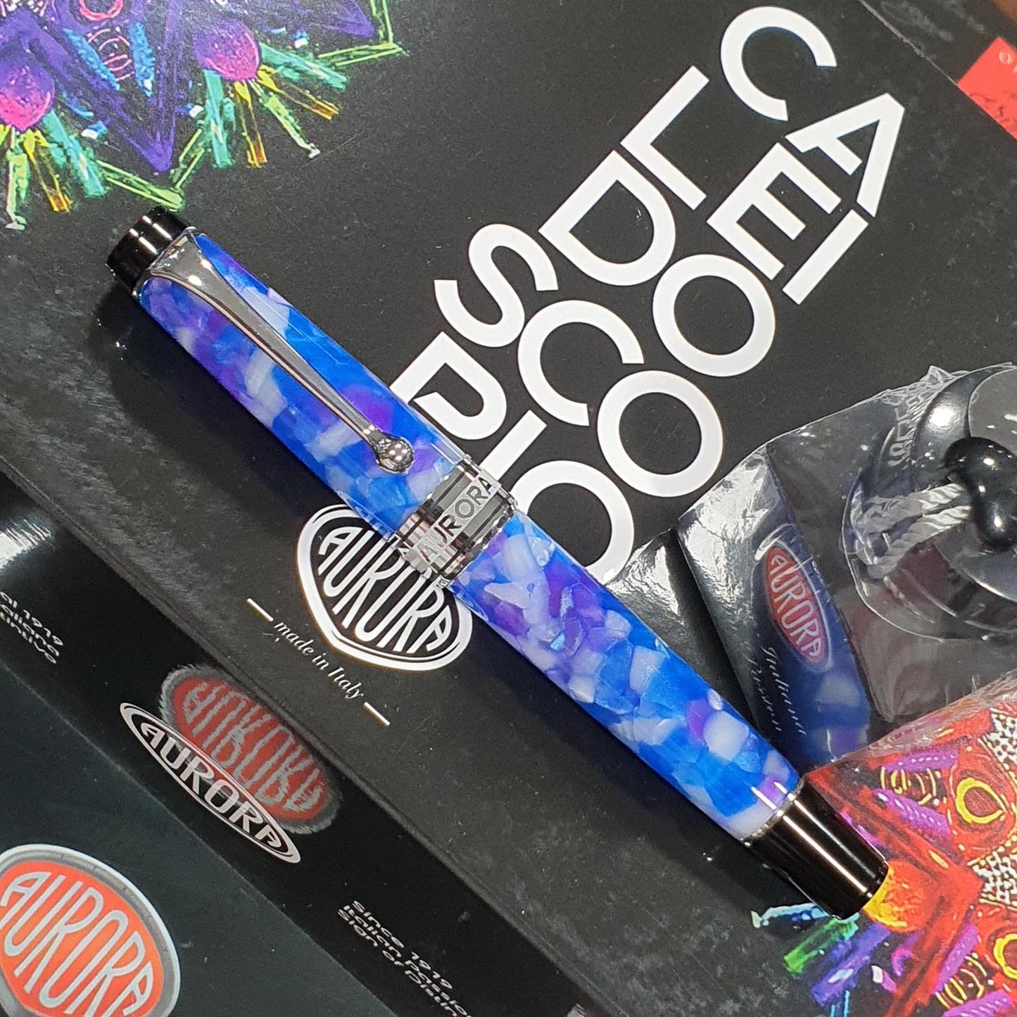 Aurora Optima Caleidoscopio Luce Blu CT Fountain Pen 996-CKB (Limited Edition) having marbled finish